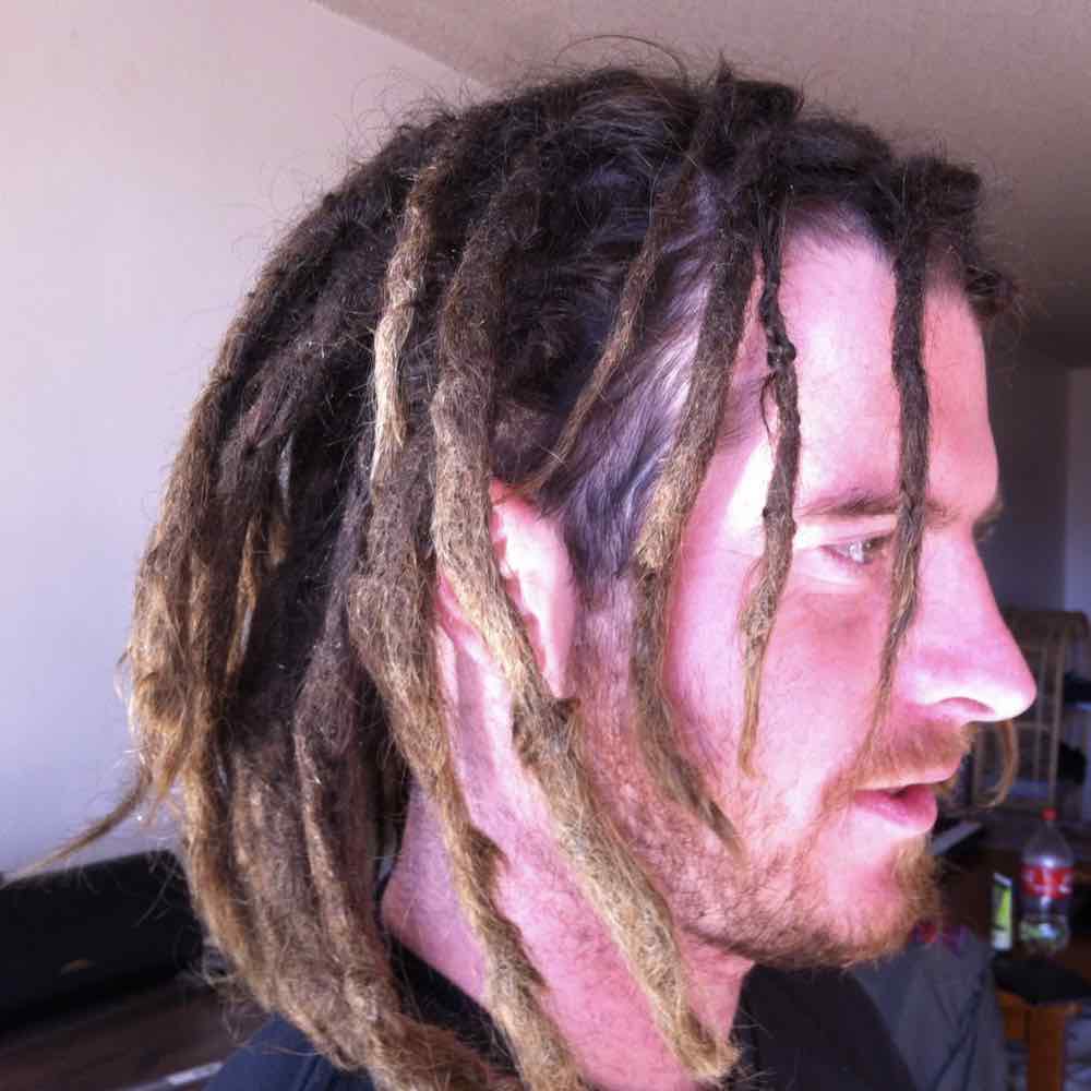 uneven dreadlocks, dread stylist, long dreads